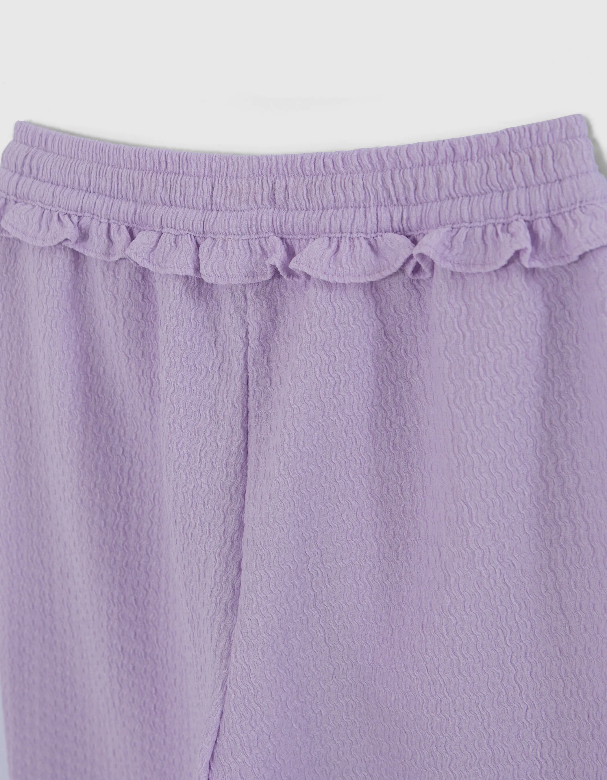 Pantalon large lilas fluide tissu relief fille