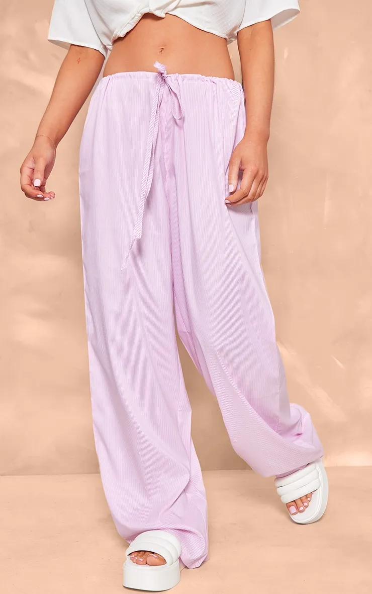 Pantalon large taille basse rose à rayures et cordons ajustables