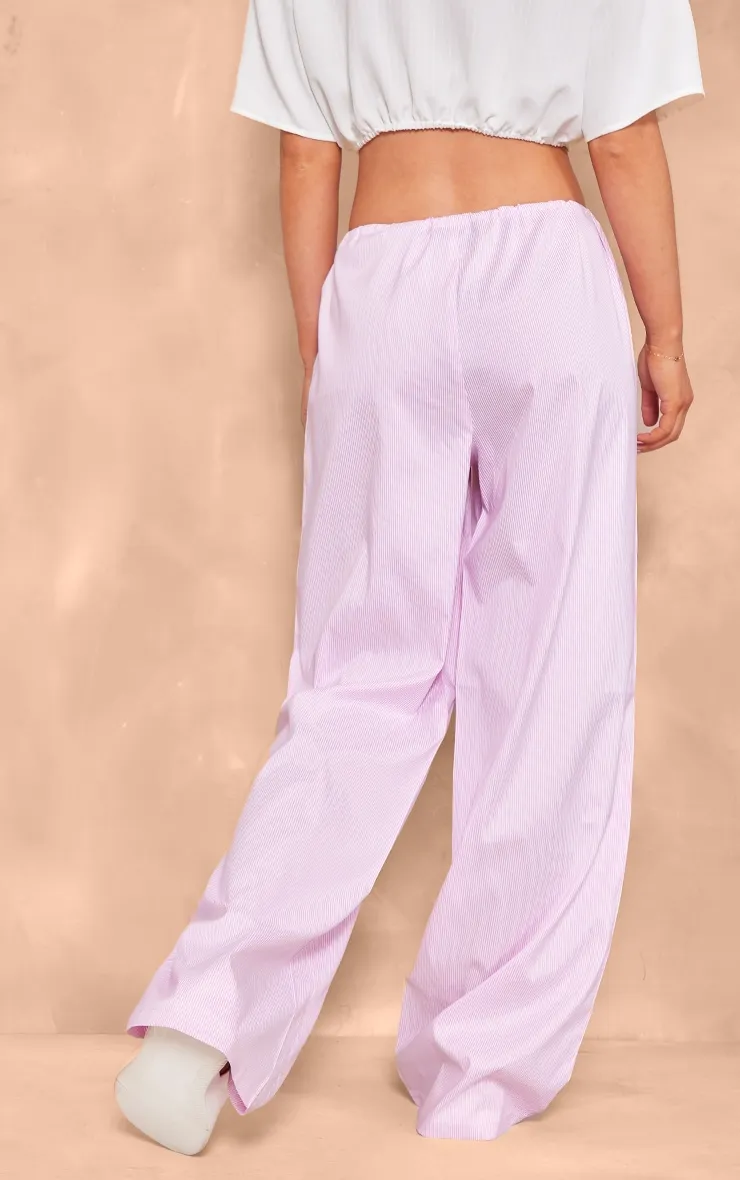 Pantalon large taille basse rose à rayures et cordons ajustables